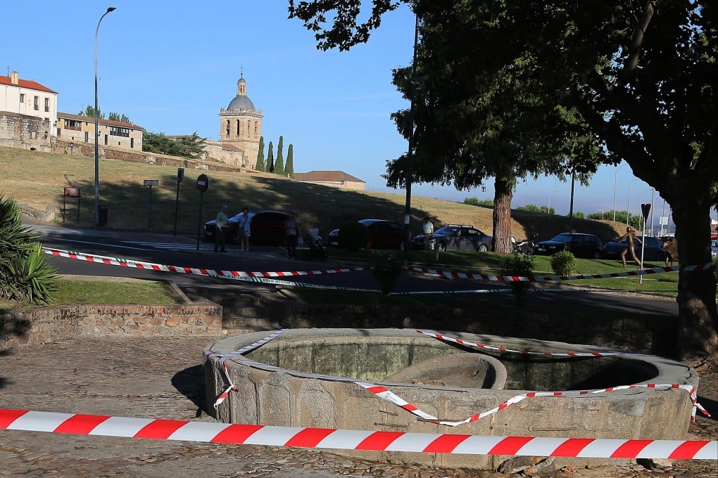 A fountain in Ciudad Rodrigo, Spain’s Salamanca province, is cordoned off on Monday after it collapsed during World Cup celebrations. Photo: EPA