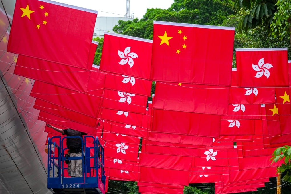 National and Hong Kong flags line Park Lane Shopper’s Boulevard in Tsim Sha Tsui, ahead of the 29th anniversary of city's return to Chinese sovereignty on July 1. Photo: Jelly Tse