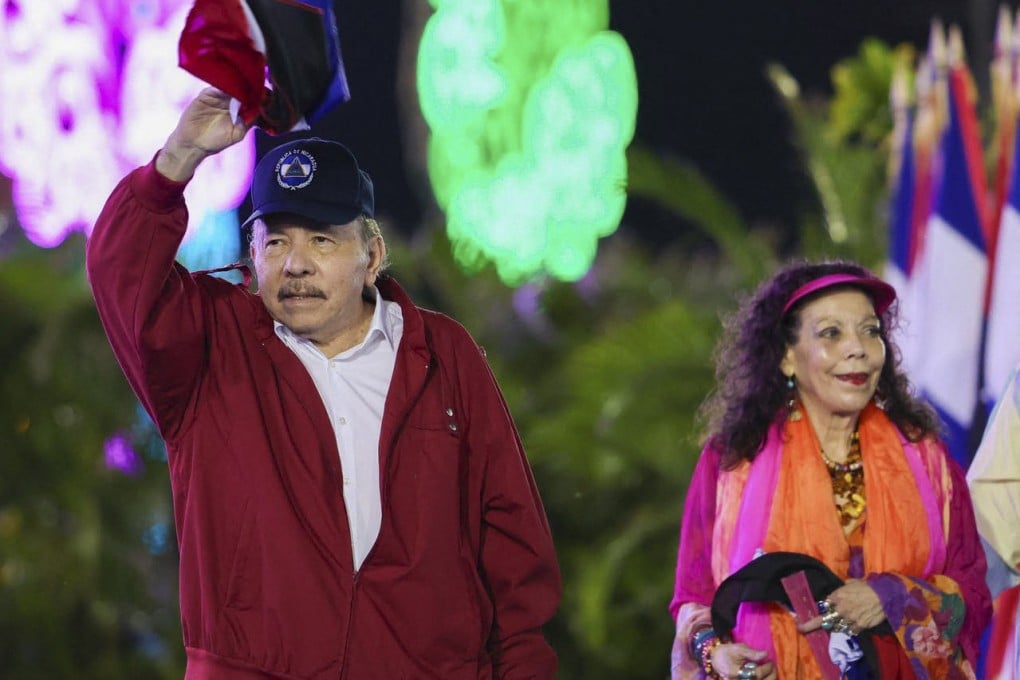 Nicaragua’s President Daniel Ortega waving next to wife and co-President Rosario Murillo. Photo: EL 19 DIGITAL via AFP