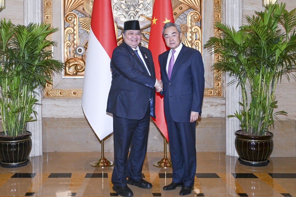 Indonesian Coordinating Minister for Economic Affairs Airlangga Hartarto (left), who represented the country at the 2026 World Artificial Intelligence Conference in Shanghai on Thursday, with Chinese Foreign Minister Wang Yi. Photo: Xinhua
