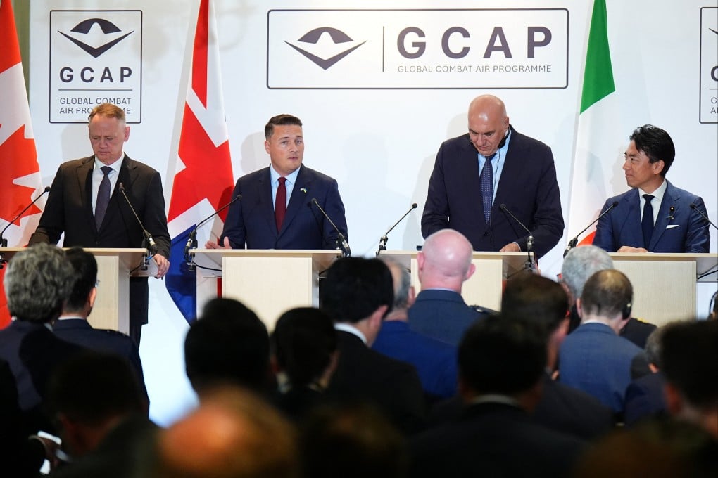 Defence ministers (fromleft) David McGuinty (Canada), Wes Streeting (Britain), Guido Crosetto (Italy) and Shinjiro Koizumi (Japan) discuss the Global Combat Air Programme at Wellington Barracks in London on Tuesday. Photo: Reuters