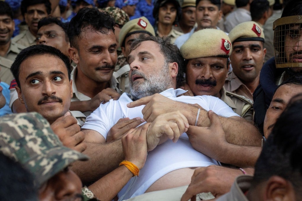 Indian opposition leader Rahul Gandhi is detained by police during a sit-in protest outside Prime Minister Narendra Modi’s residence, demanding accountability for police action against students, in New Delhi on Tuesday. Photo: Reuters