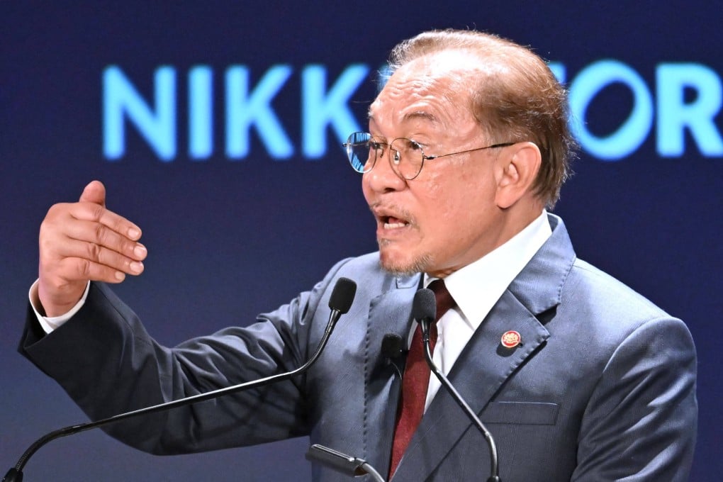 Malaysia’s Prime Minister Anwar Ibrahim delivers a speech at the Nikkei Forum in Tokyo in June. Photo: AFP