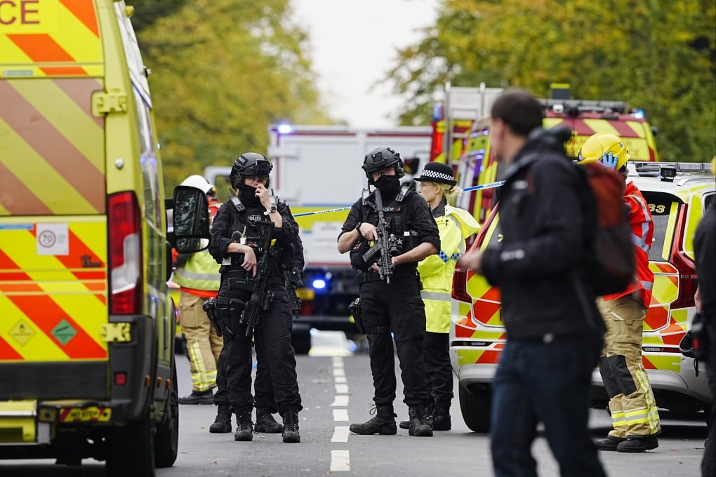 Police officers and emergency services work on the scene at Heaton Park Hebrew Congregation Synagogue in Manchester on October 2. Photo: Xinhua