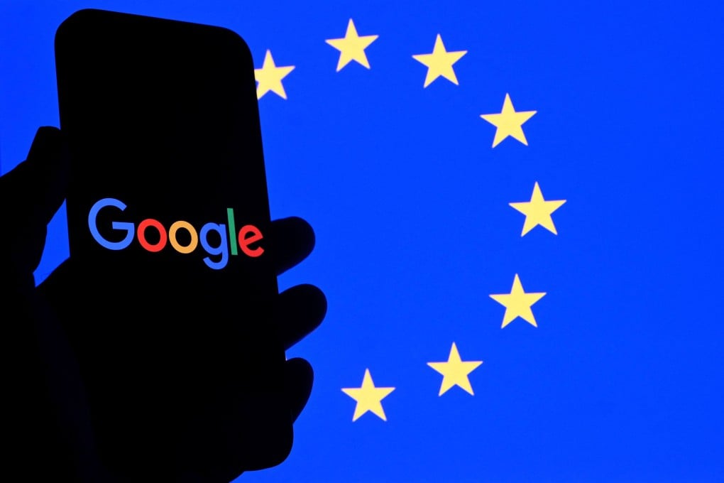 An illutration shows the logo of Google displayed on a smartphone in front of an European Union flag. The US tech titan accused the EU of dismantling safety protections on Google Play. Photo: AFP