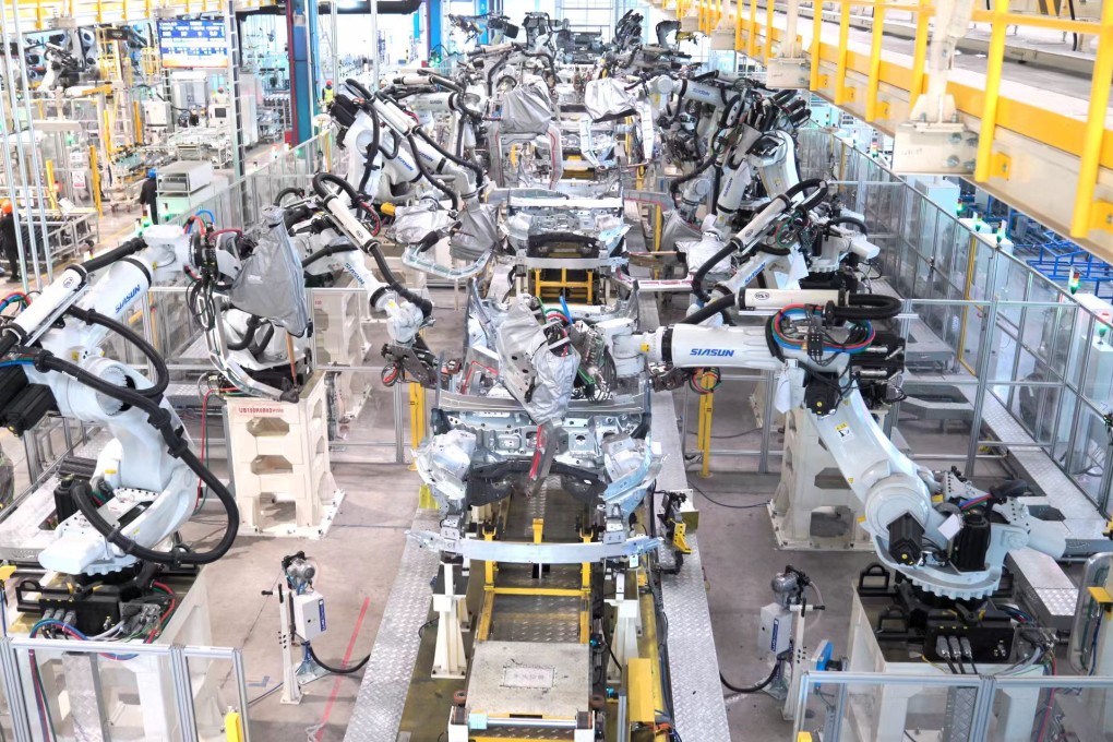 Welding robots at work at Geely’s plant in Yiwu, China’s Zhejiang province. Photo: Xinhua