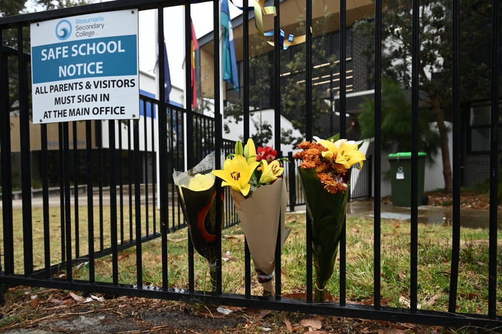 Flowers left in tribute to Bianca Jones and Holly Bowles, who died from methanol poisoning in Laos, outside Beaumaris Secondary College in Melbourne on November 25, 2024. Photo: EPA-EFE
