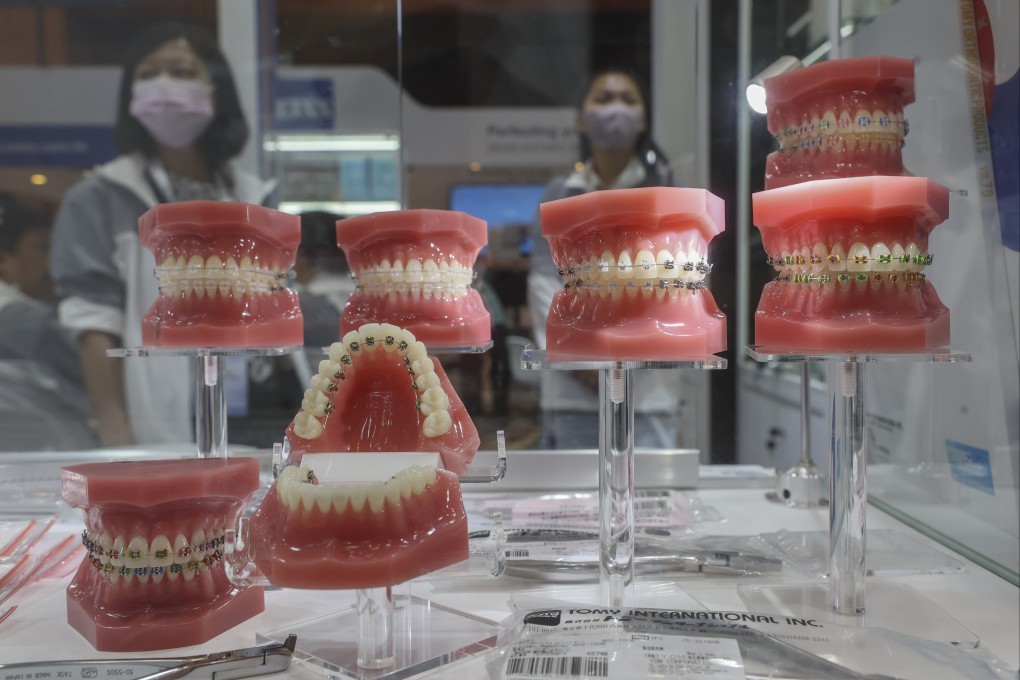 Models of gums and teeth at a Hong Kong dental expo. The Health Bureau and the Department of Health said they were following up on reports about booths run by mainland Chinese dental clincs in the city. Photo: Edmond So