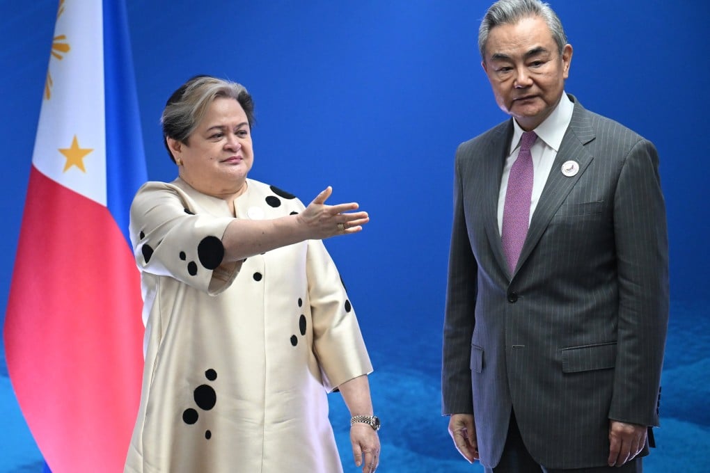 Philippine Foreign Minister Theresa Lazaro meets her Chinese counterpart Wang Yi on the sidelines of the Asean meeting in Manila on Wednesday. Photo: EPA