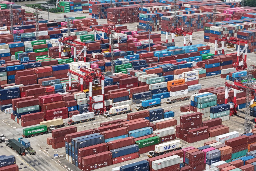 Shipping containers are seen stacked at a Port of Shanghai terminal on July 14. Photo: VCG via Getty Images