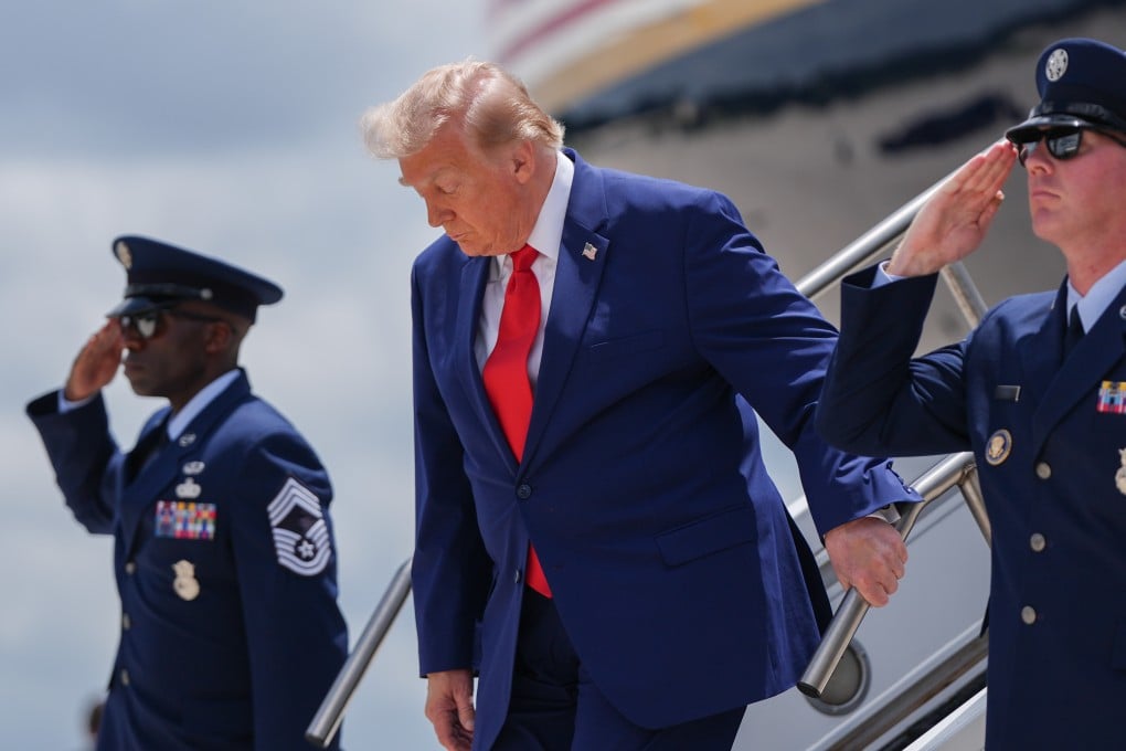 US President Donald Trump arrives at Dobbins Air Reserve Base on Air Force One on Wednesday. Photo: AP