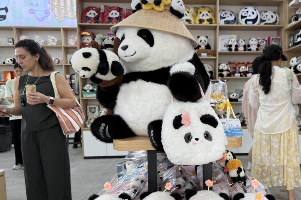 Stuffed panda dolls inspired by Hua Hua, the most popular panda living at the Chengdu Research Base of Giant Panda Breeding in China, are displayed at a gift shop at the research base. Photo: The Korea Times