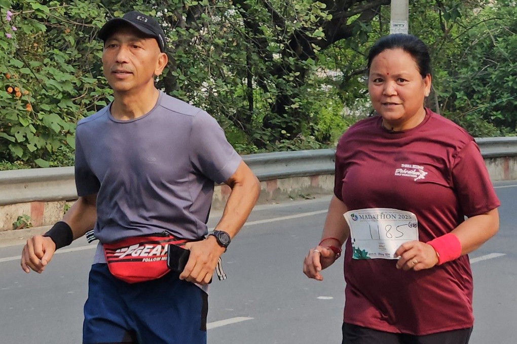 Tara (left) and Sushila Thapa run a 10km race in their home city of Dehradun, India, in 2025. Both have overcome chronic pain since taking up running in middle age, and now inspire others to do the same. Photo: Tara Thapa