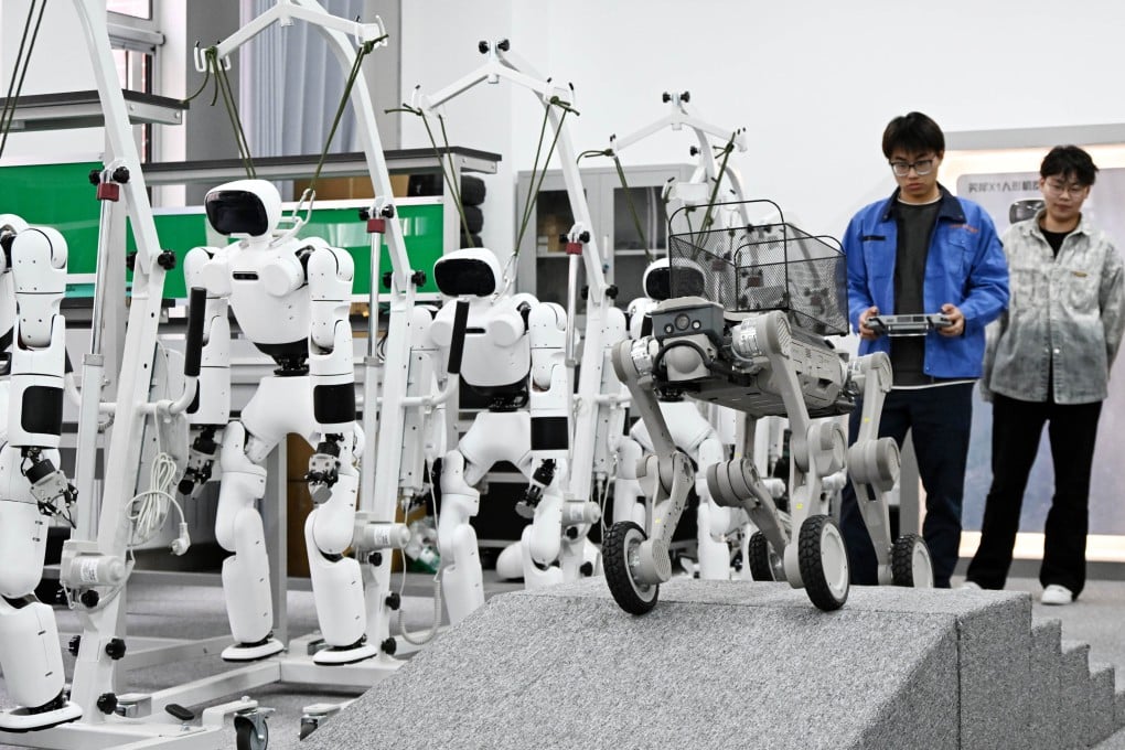 Students put robots through their paces at a vocational school in Qingdao, Shandong province, in March. Photo: Xinhua