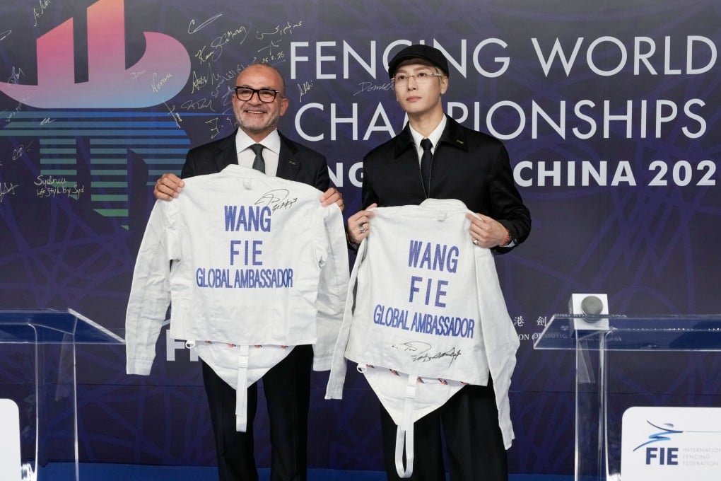 New global ambassador Jackson Wang (right) is “part of the family”, said Donald Anthony Jnr, vice-president of the International Fencing Federation, on Saturday. Photo: Dickson Lee