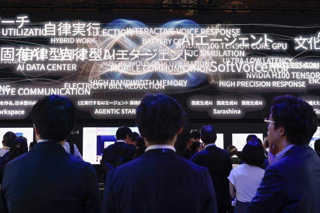 Visitors gather at a tech event in Tokyo organised by SoftBank aimed at defining the future of AI-driven society and business this month. Photo: EPA