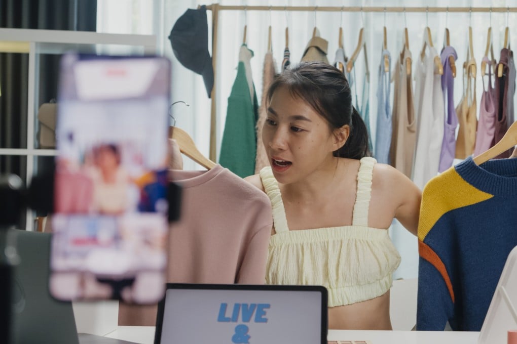 Selling second-hand clothes on TikTok, speculating on Pokemon cards and setting up home cafes are among the side hustles Singaporeans are turning to as a safety net. Photo: Shutterstock