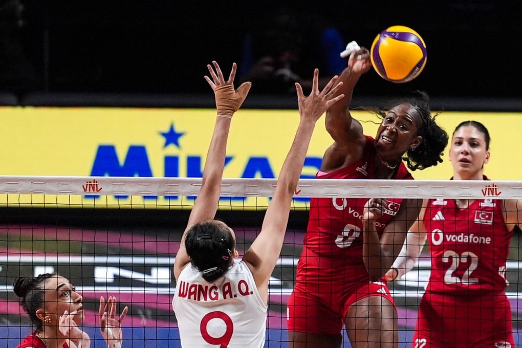 Turkish middle blocker Sinead Jack-Kısal challenges Chinese rival Wang Aoqi during their Women’s Volleyball Nations League Finals clash in Macau. Photo: Getty Images