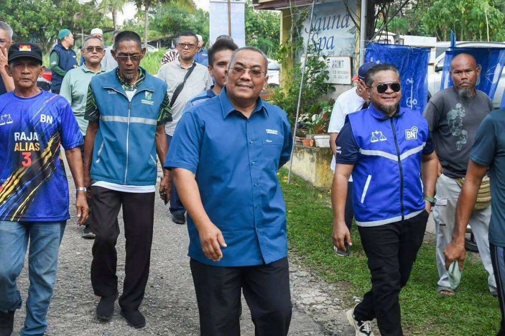 Muhammad Sanusi Md Nor (centre) campaigns with Perikatan Nasional supporters in Negeri Sembilan on Saturday. Photo: Facebook/N24MuhammadSanusiMdNor