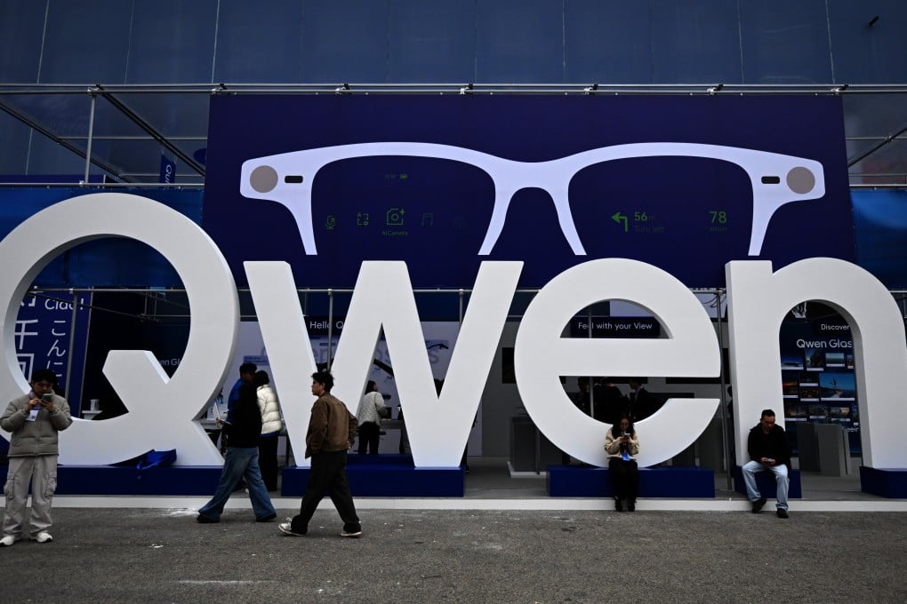 People walk past Qwen’s booth during the 2026 Mobile World Congress in Barcelona, Spain, on March 2. Chinese open-weight models accounted for 41 per cent of downloads on Hugging Face in the year to February 2026, compared with 36.5 per cent for American models. Photo: Xinhua