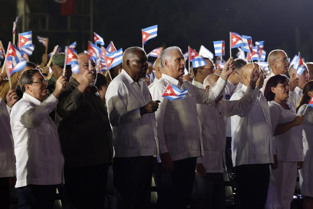 Cuban President Miguel Diaz-Canel, centre, is seen during a political ceremony marking the 73rd anniversary of the failed assault on the Moncada Barracks in Havana, Cuba on Sunday. Photo: EPA
