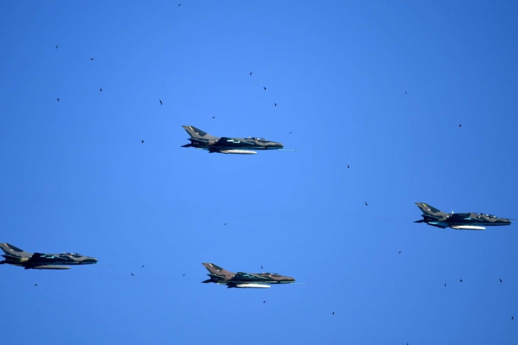 Myanmar Air Force fighter jets perform manoeuvres in 2023. A report by conflict monitor ACLED indicates the junta has intensified its aerial bombing campaign in 2026. Photo: AFP