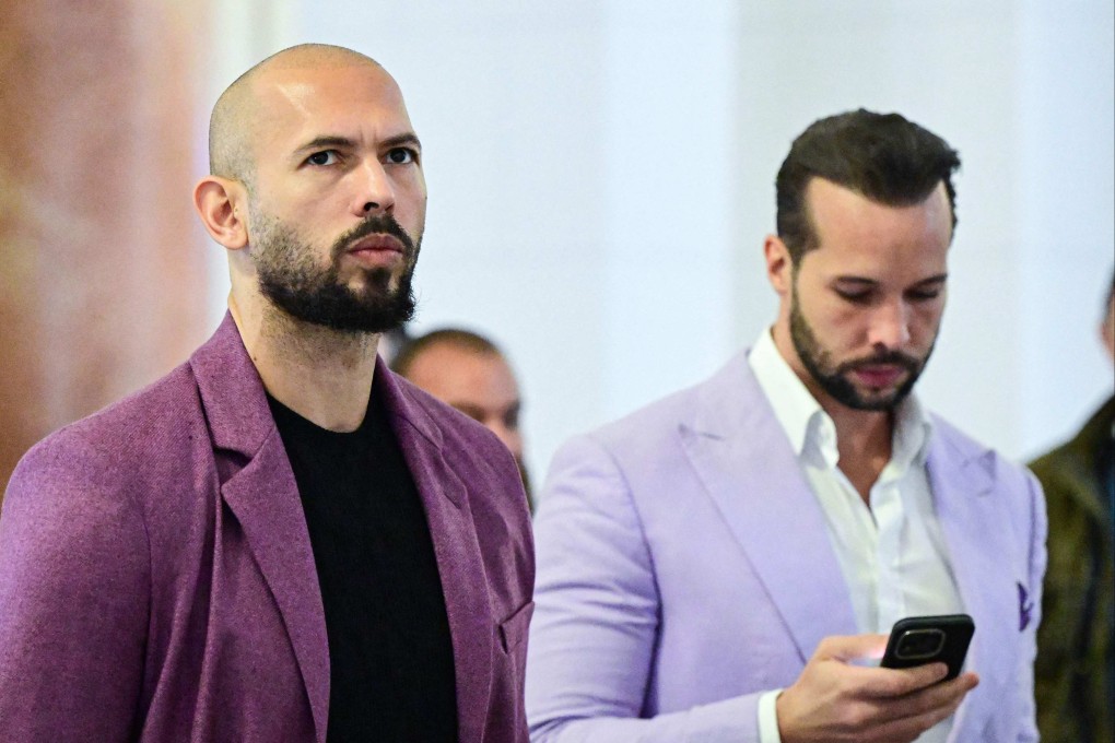 Andrew Tate, left, and his brother Tristan Tate appear in court in Bucharest, Romania, in 2024. Photo: AFP