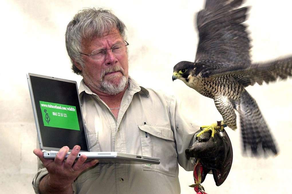 British actor and wildlife presenter Bill Oddie with a Peregrine falcon in 2004. The 85-year-old died at the weekend, his agent said on Monday. Photo: PA via AP