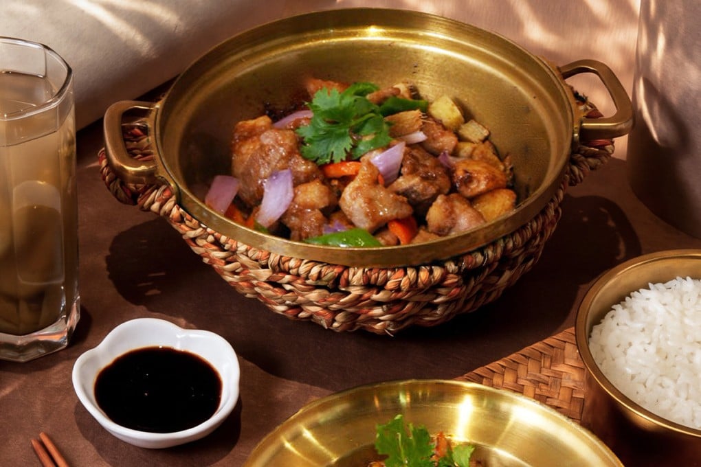 A dish at Golden Clay Pot Rice at Harbour City’s new elevated food court concept, Food Atlas. Photo: Food Atlas
