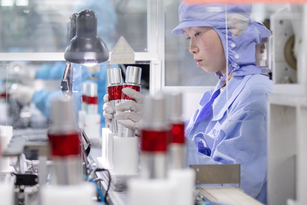 An employee works on a skincare production line at Proya’s Huzhou production base on March 9, 2026. AI is rapidly reshaping China’s beauty industry by shrinking every stage of product development. Photo: VCG via Getty Images