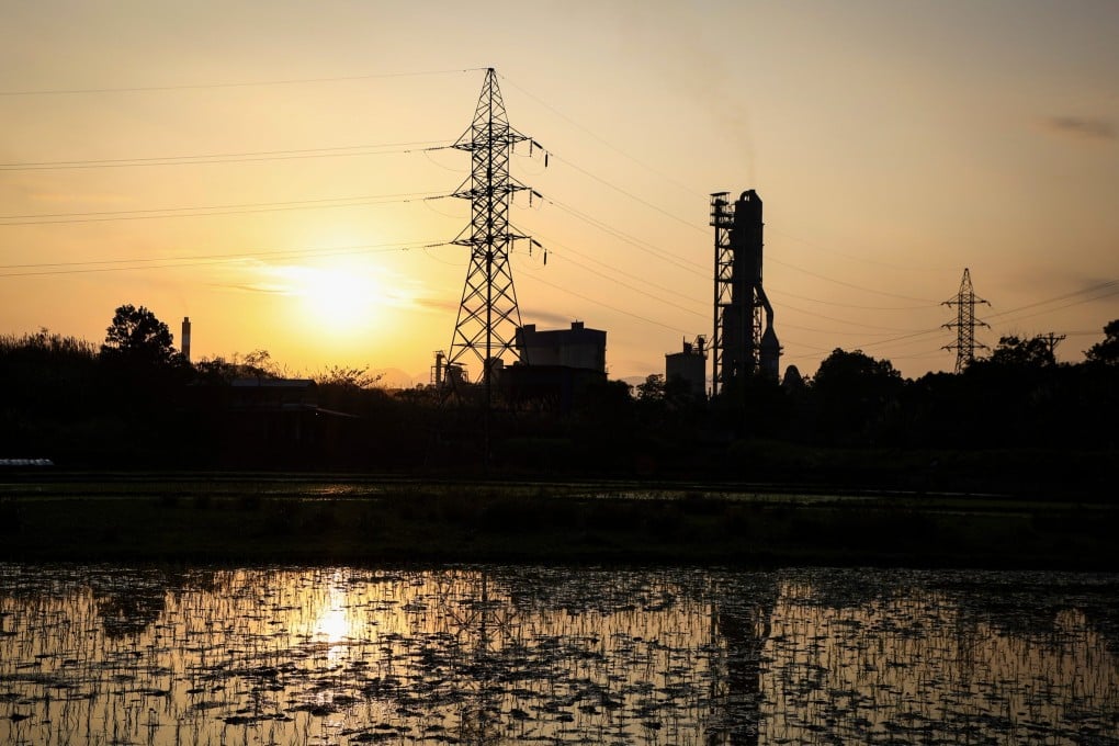 A power plant and transmission lines in Thai Nguyen province, Vietnam. The International Development Finance Corporation has reportedly held talks with Vietnam on grid modernisation. Photo: AP