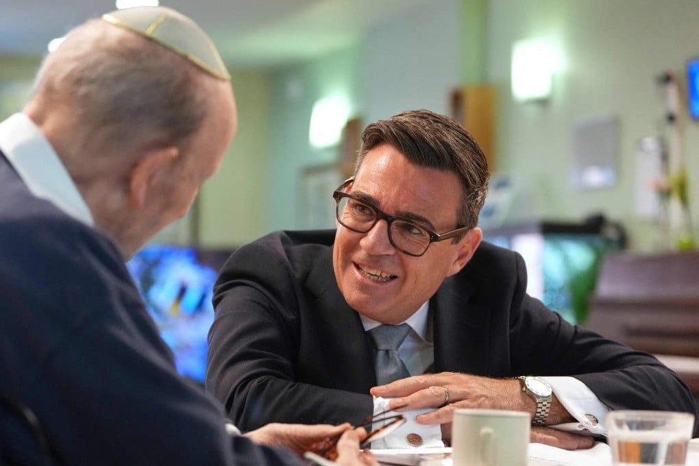 Britain’s Prime Minister Andy Burnham meets residents as he visits social care organisation Jewish Care, in northwest London on Wednesday. Photo: AFP