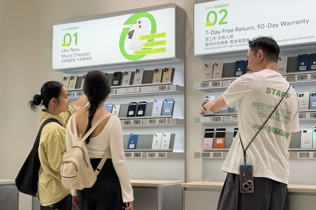 Customers browse used devices at the newly opened ReRe outlet in Hong Kong. Photo: Handout