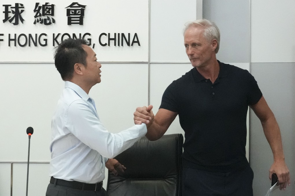 Jorn Andersen bids farewell to local football association general secretary Charles Cheung after confirming his exit in May 2024. Photo: May Tse