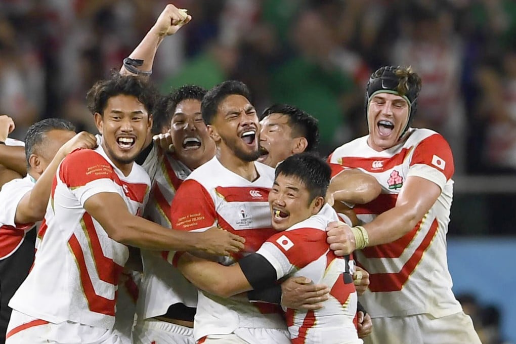 Timothy Lafaele (centre) and Japan teammates celebrating their 2019 Rugby World Cup pool-stage win over Ireland in Fukuroi, Shizuoka Prefecture. Photo: Kyodo