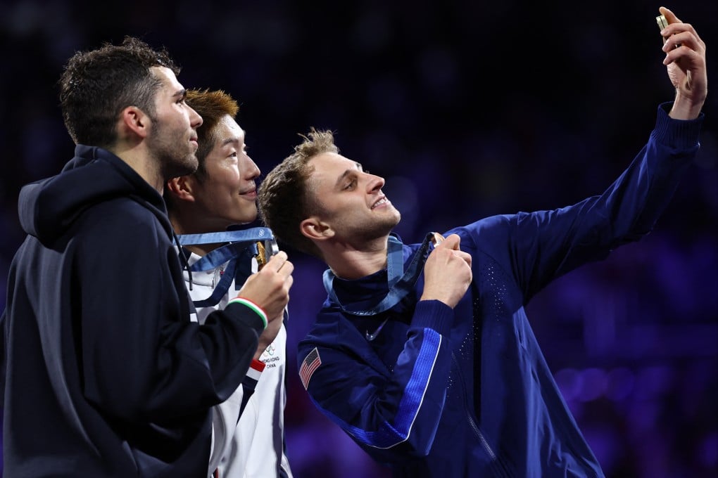 Filippo Macchi (left) with Cheung Ka-long and bronze medallist Nick Itkin on the Paris Olympics podium. Photo: AFP
