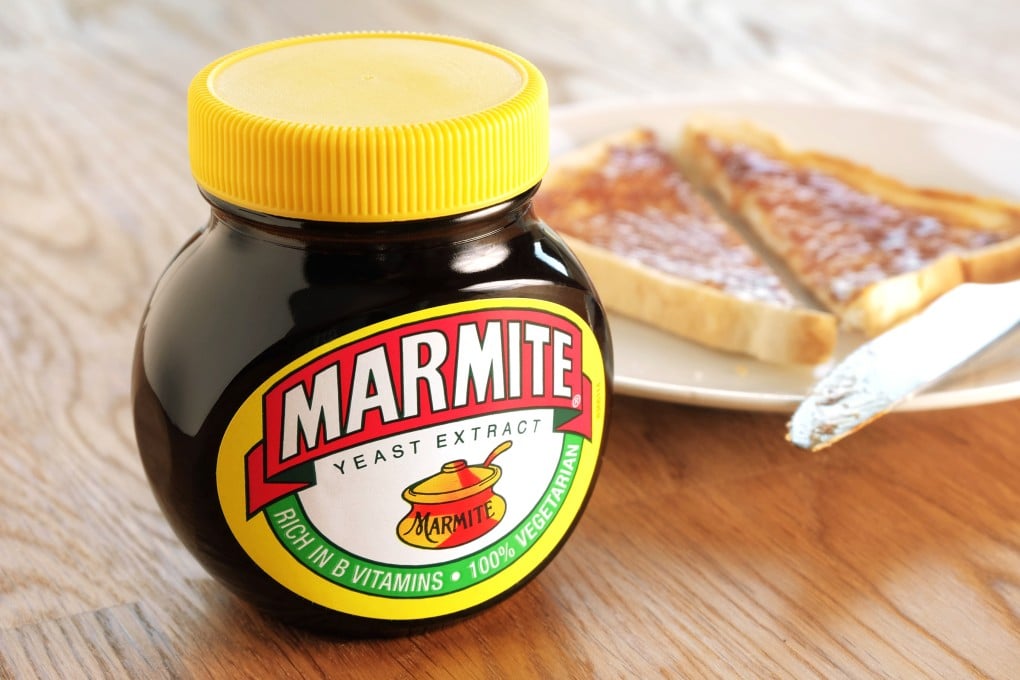 A jar of Marmite alongside one of the preferred vehicles for enjoying the divisive yeast spread: a slice of toast with butter. Photo: Shutterstock