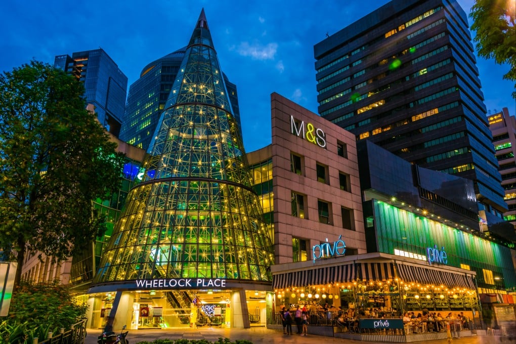 Wheelock Place comprises a 21-storey commercial building with offices, a retail podium and two basement levels with shops and car parks. Photo: Shutterstock Images