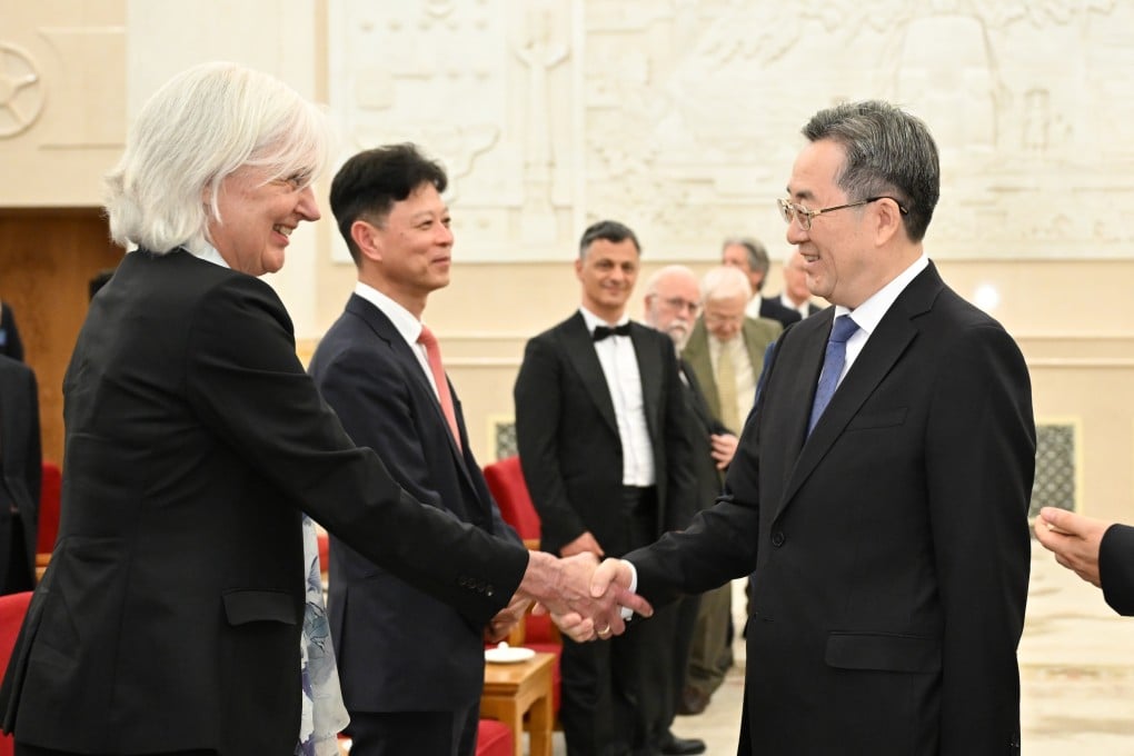 Chinese Vice-Premier Ding Xuexiang meets winners of the China International Science and Technology Cooperation Award at the Great Hall of the People in Beijing on July 8. Photo: Xinhua