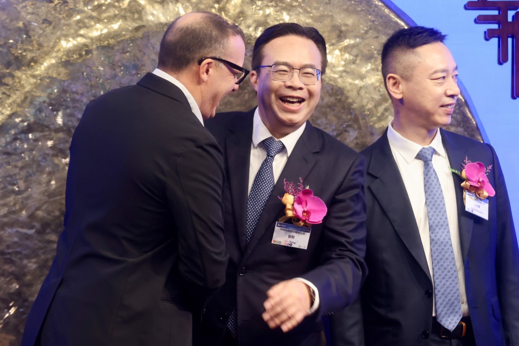 The listing ceremony for Zhongji Innolight at Hong Kong Exchanges and Clearing on Thursday, featuring chairman Liu Sheng (centre). Photo: Jonathan Wong