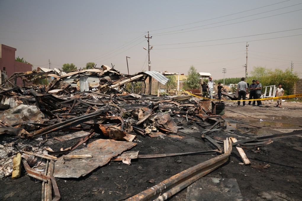 The aftermath of an air strike on a Popular Mobilisation Forces base in Mosul, Iraq. Photo: AP