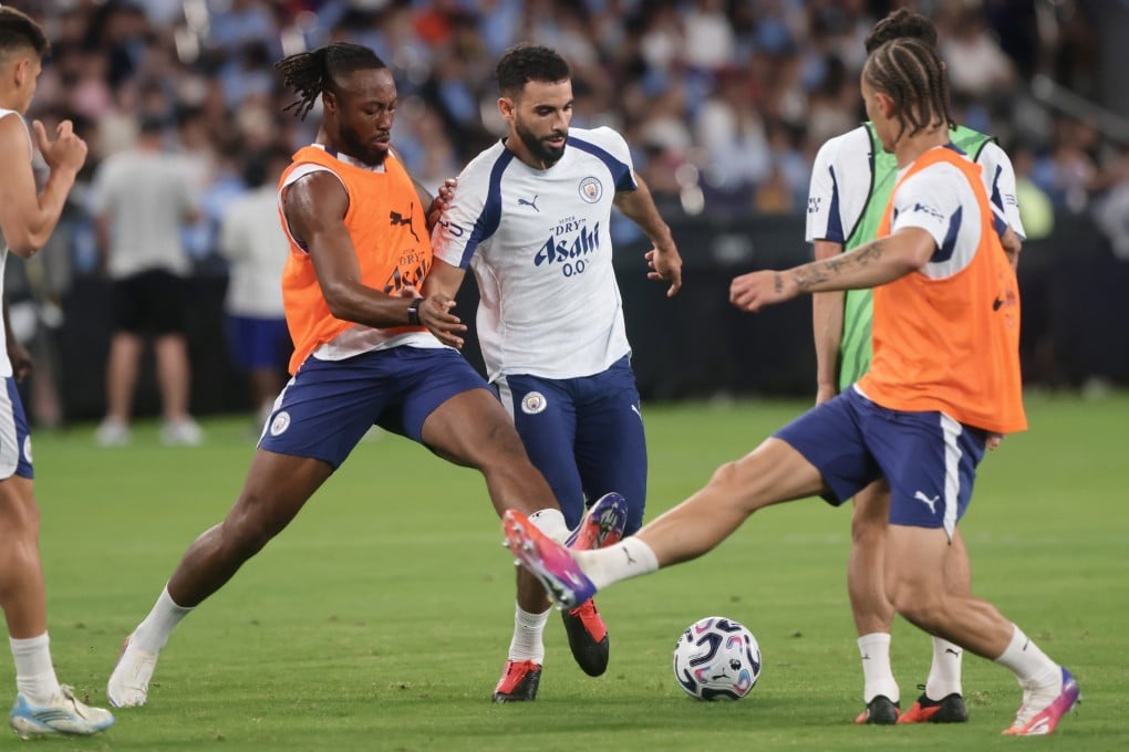 Rayan Ait-Nouri fends off Antoine Semenyo during Manchester City’s training session at Kai Tak Stadium. Photo: Jonathan Wong