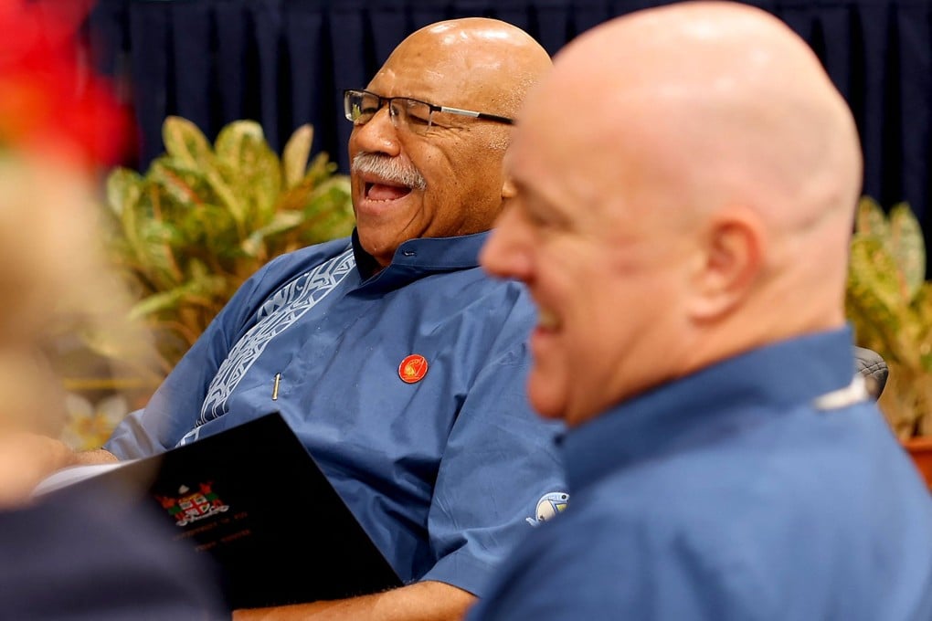 Fiji’s Prime Minister Sitiveni Rabuka (left) meets with New Zealand’s Prime Minister Christopher Luxon on the sidelines of the Pacific Islands Forum summit in Honiara, the capital of the Solomon Islands, in 2025. Photo: AFP