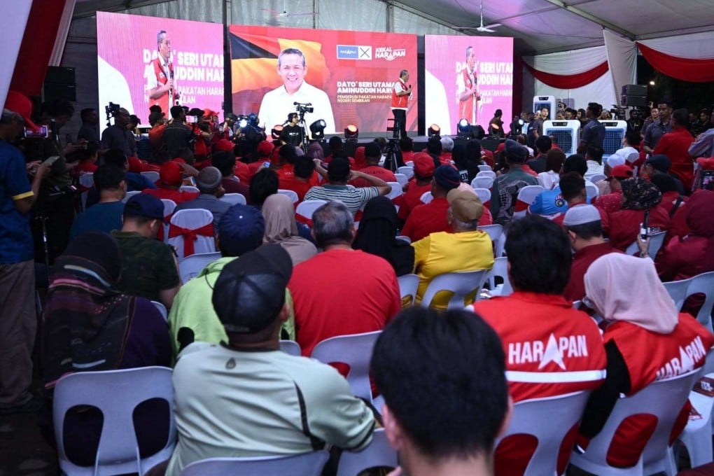 Pakatan Harapan supporters listen to a Negeri Sembilan candidate's speech on July 23. Photo: Facebook/pakatanharapan.my
