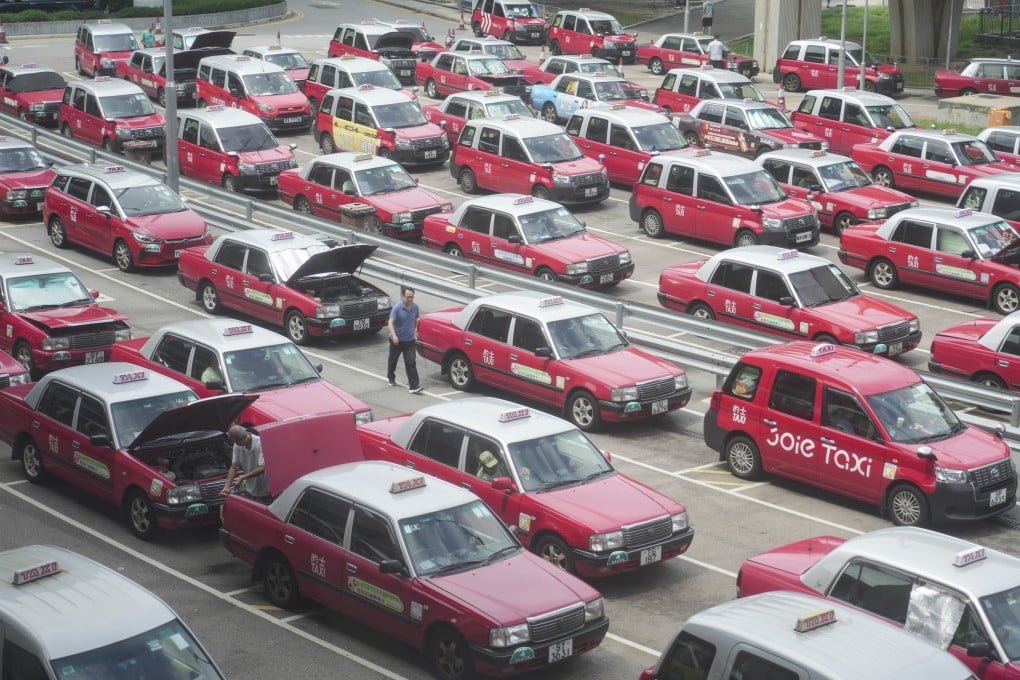 Regular and premium taxis queue at Hong Kong International Airport on July 15. Photo: Sam Tsang