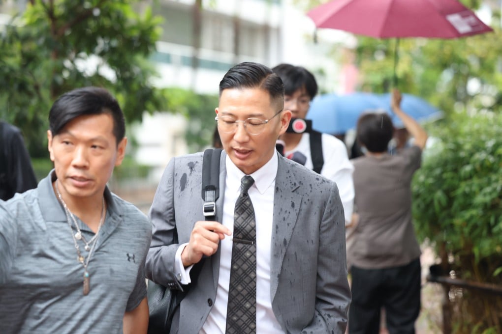 Senior Superintendent Ian Chow (centre) leaves West Kowloon Court on Friday after being sentenced to jail. Photo: Brian Wong