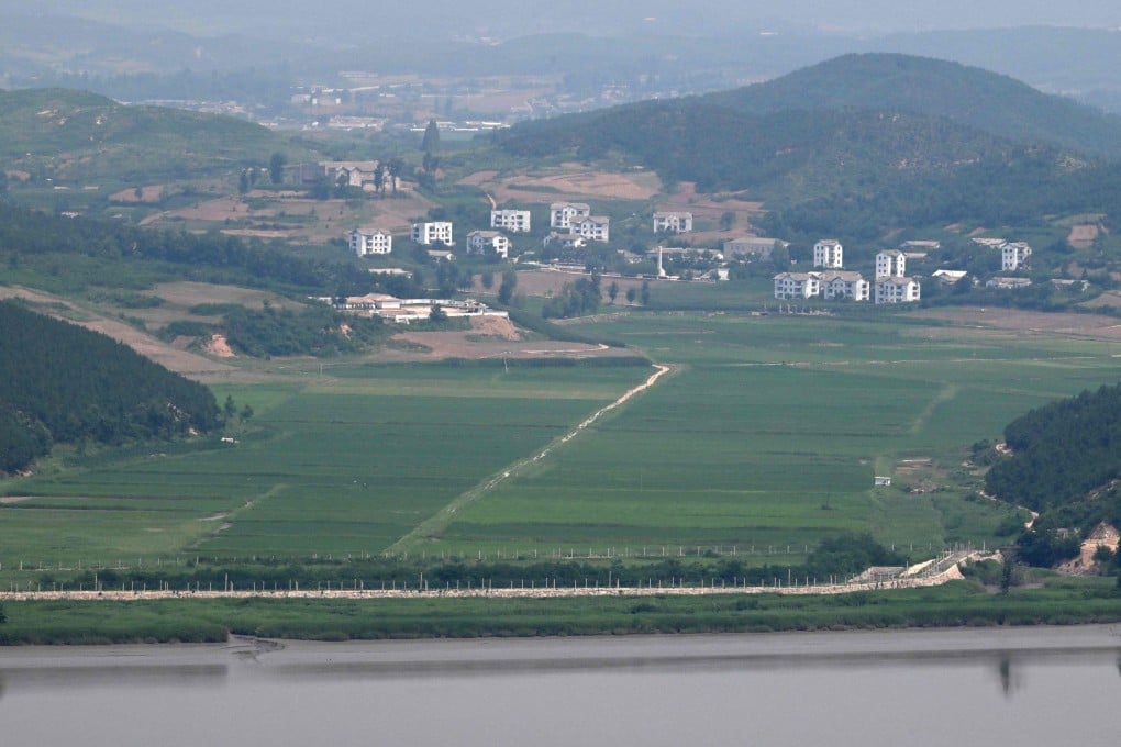 North Korea’s border county of Gaepung is seen from a South Korean observation deck at Aegibong Peace Ecopark in Gimpo on July 1. Photo: AFP