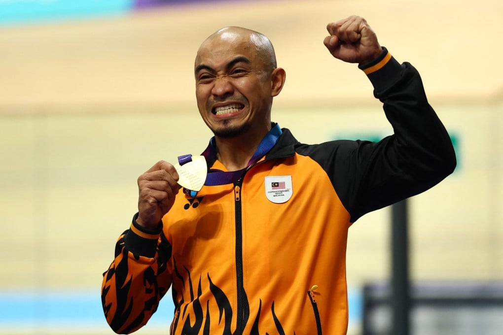 Malaysia’s Azizulhasni Awang celebrates winning Commonwealth Games gold at the Sir Chris Hoy Velodrome. Photo: Reuters