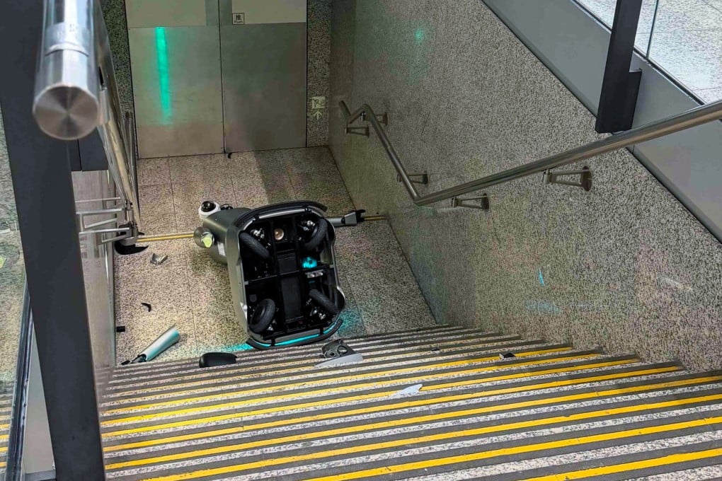 The robot lies at the bottom of the staircase with its arms shattered into pieces. Photo: Handout