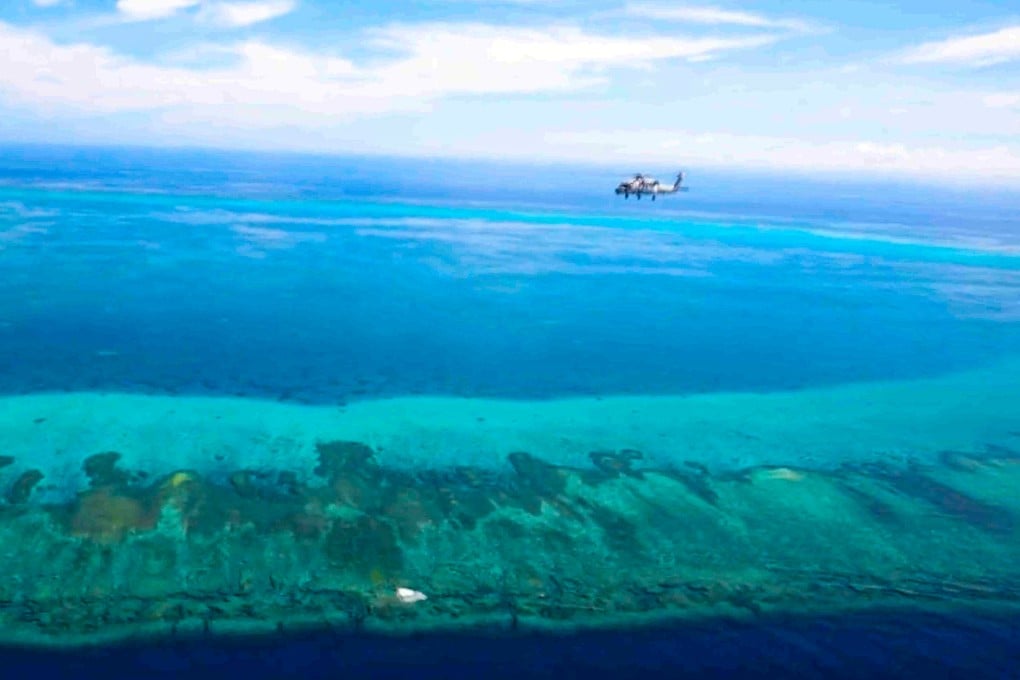 The PLA carries out joint naval and air drills around Scarborough Shoal on August 1, days after the Philippines filed its official nautical chart for the disputed South China Sea feature with the United Nations. Photo: Handout